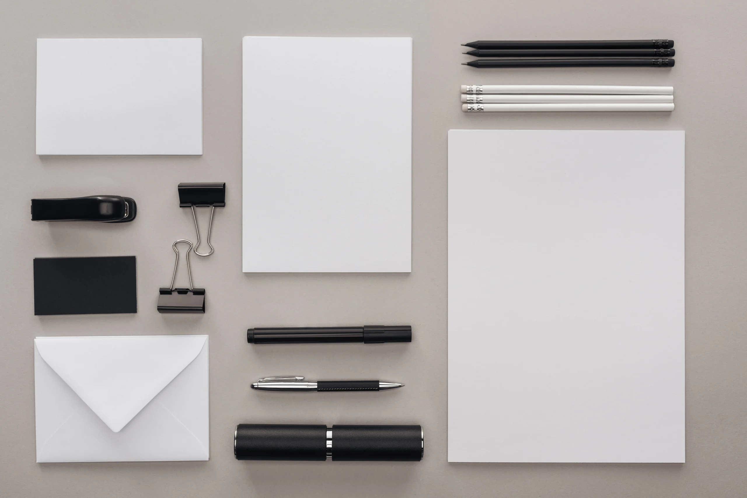 flat-lay-with-black-and-white-stationery-at-workpl-2026-03-11-04-16-50-utc